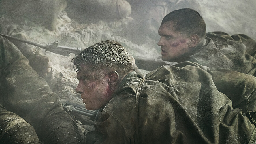 Actors Nicholas Galitzine and Ray Nicholson in a scene depicting the Battle of Okinawa in the movie “The Mosquito Bowl.”