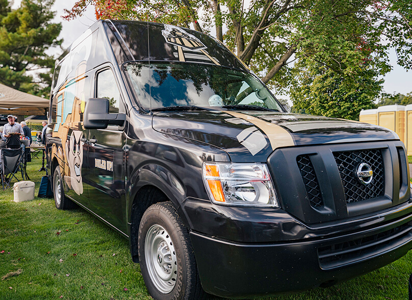 The Thompson family van during a tailgate.  