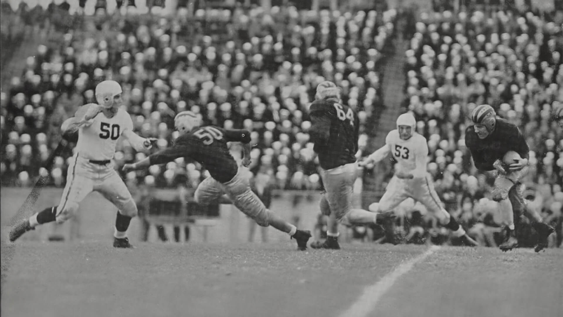 Tony Butkovich carries the ball during a Purdue football game in 1943.